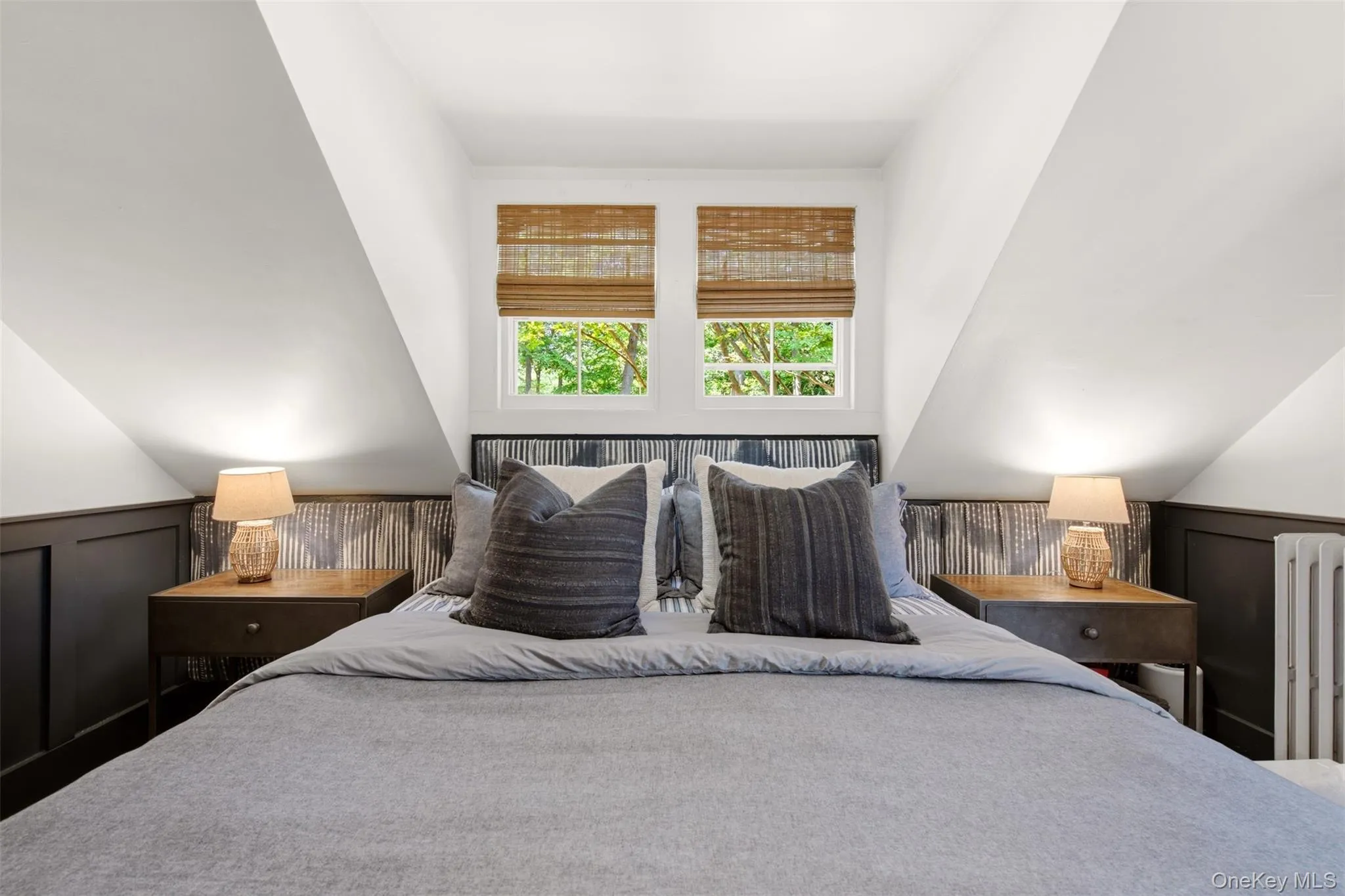 Primary Bedroom w/ built-in headboard Primary Bedroom w/ built-in headboard