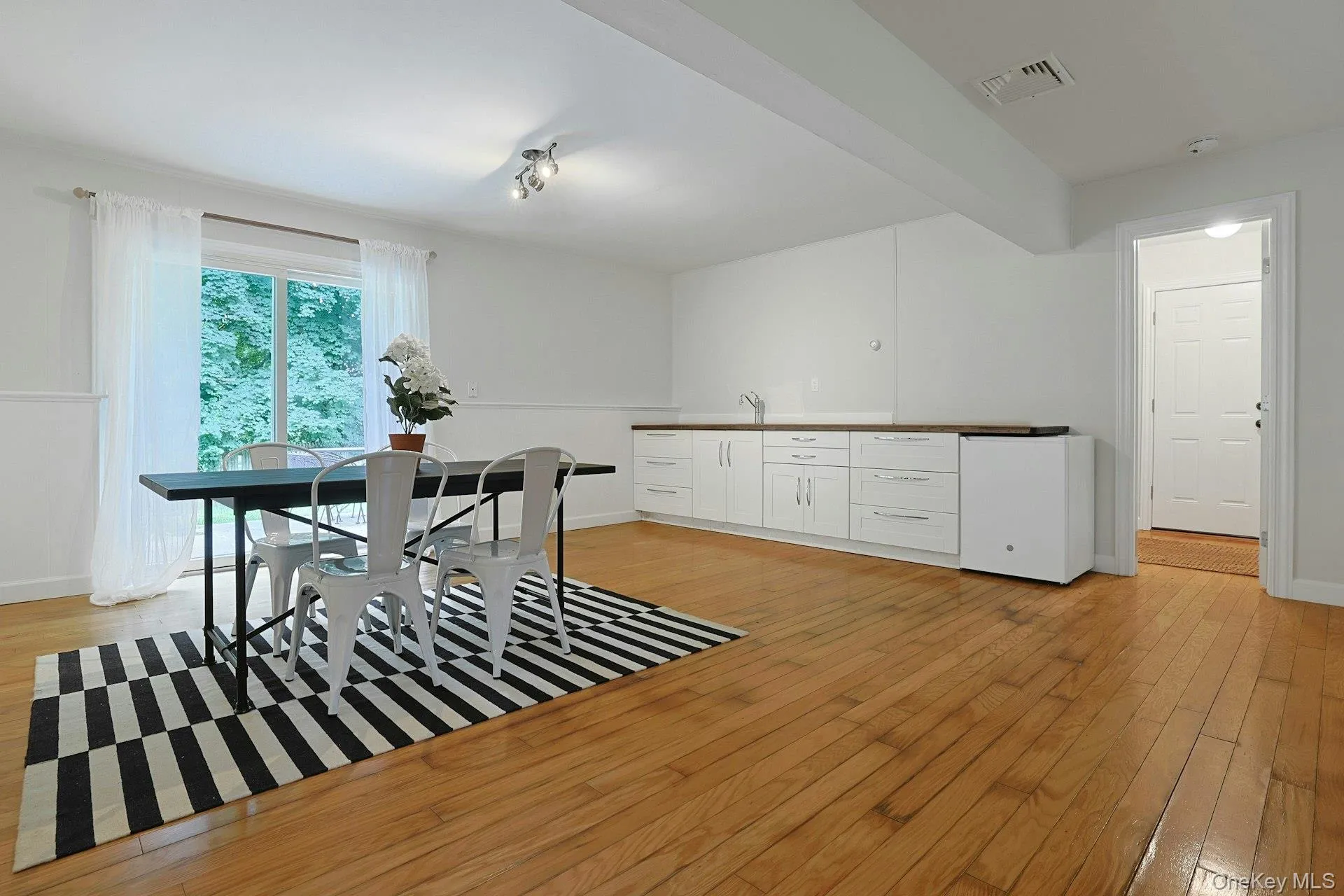 Lower Level Family Room with kitchenette counters Lower Level Family Room with kitchenette counters