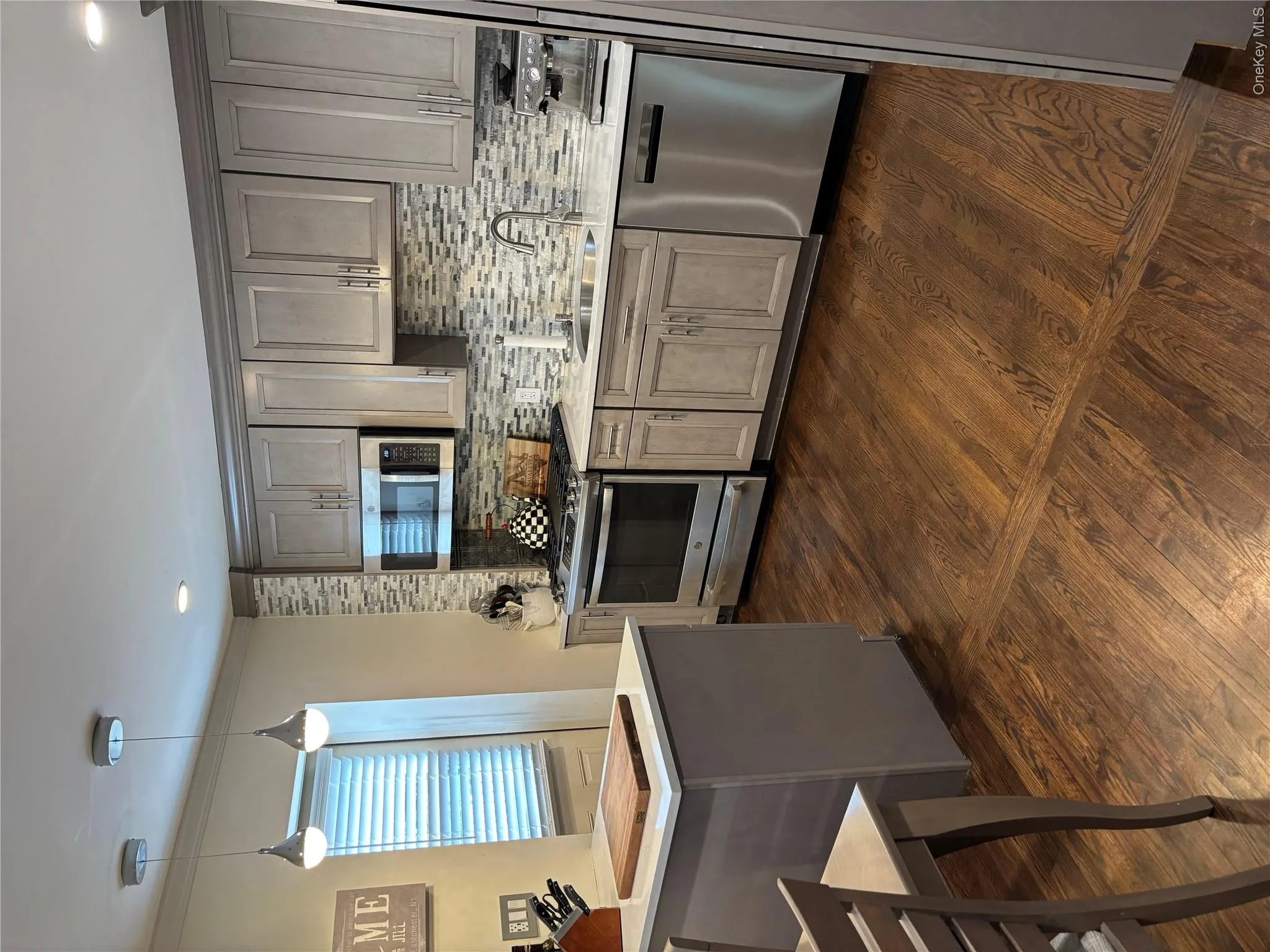 Kitchen offers large pantry and access to private patio Kitchen offers large pantry and access to private patio