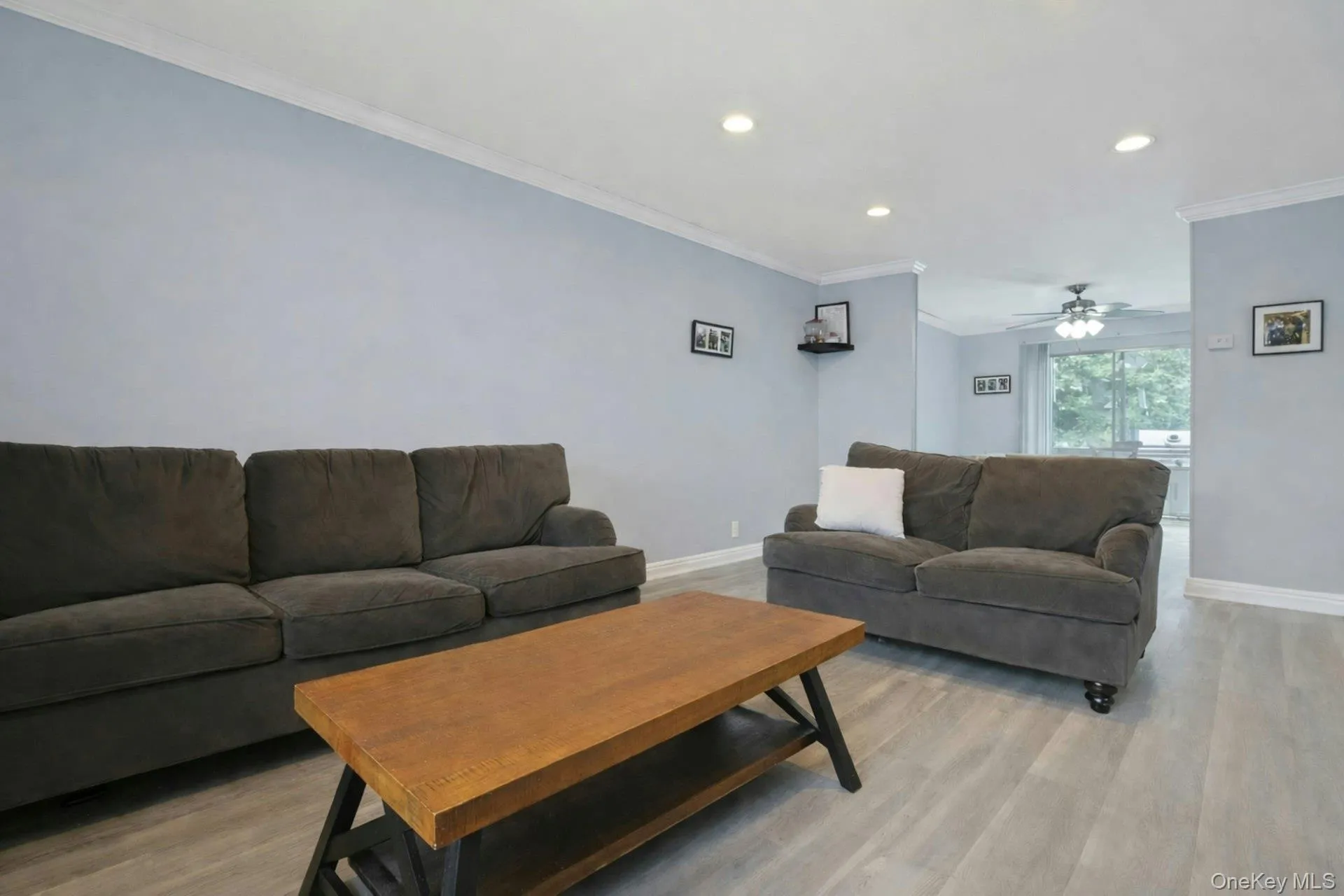 Inside, the large living room is bright and open to the spacious dining room. Inside, the large living room is bright and open to the spacious dining room.