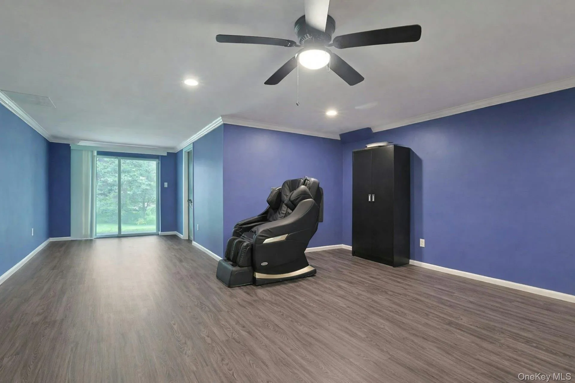 The expansive lower level family room has sliding doors out to the rear patio. The expansive lower level family room has sliding doors out to the rear patio.