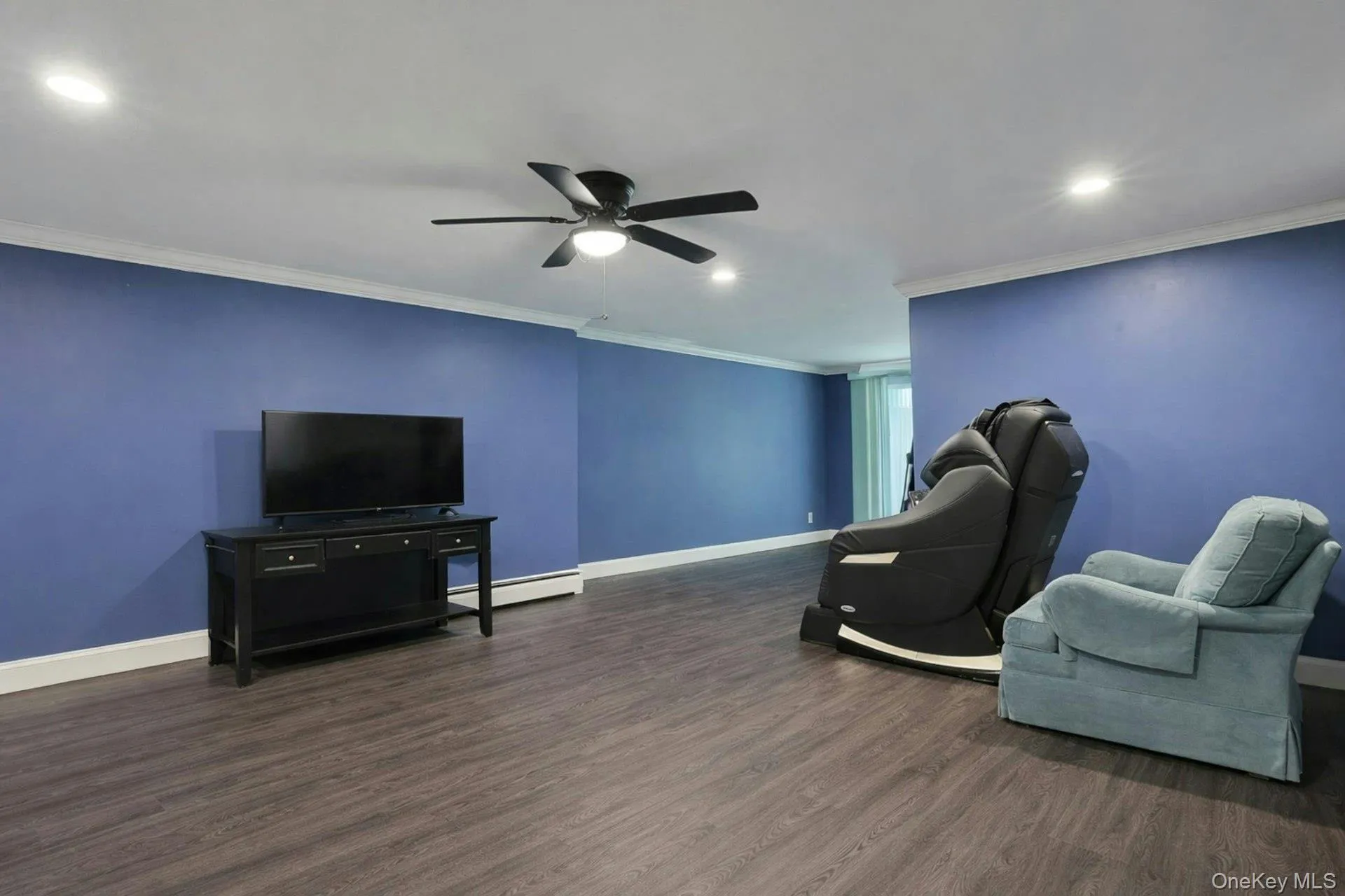 This updated space with newer floors and recessed light is a perfect game day retreat. Past the sliding glass doors is an extra storage room, available for tenants. This updated space with newer floors and recessed light is a perfect game day retreat. Past the sliding glass doors is an extra storage room, available for tenants.