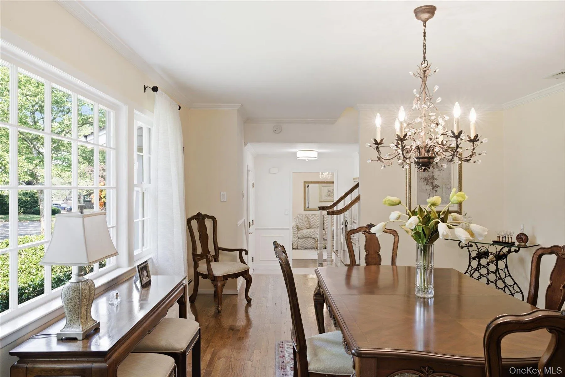 Spacious dining area featuring abundant natural light and classic finishes Spacious dining area featuring abundant natural light and classic finishes