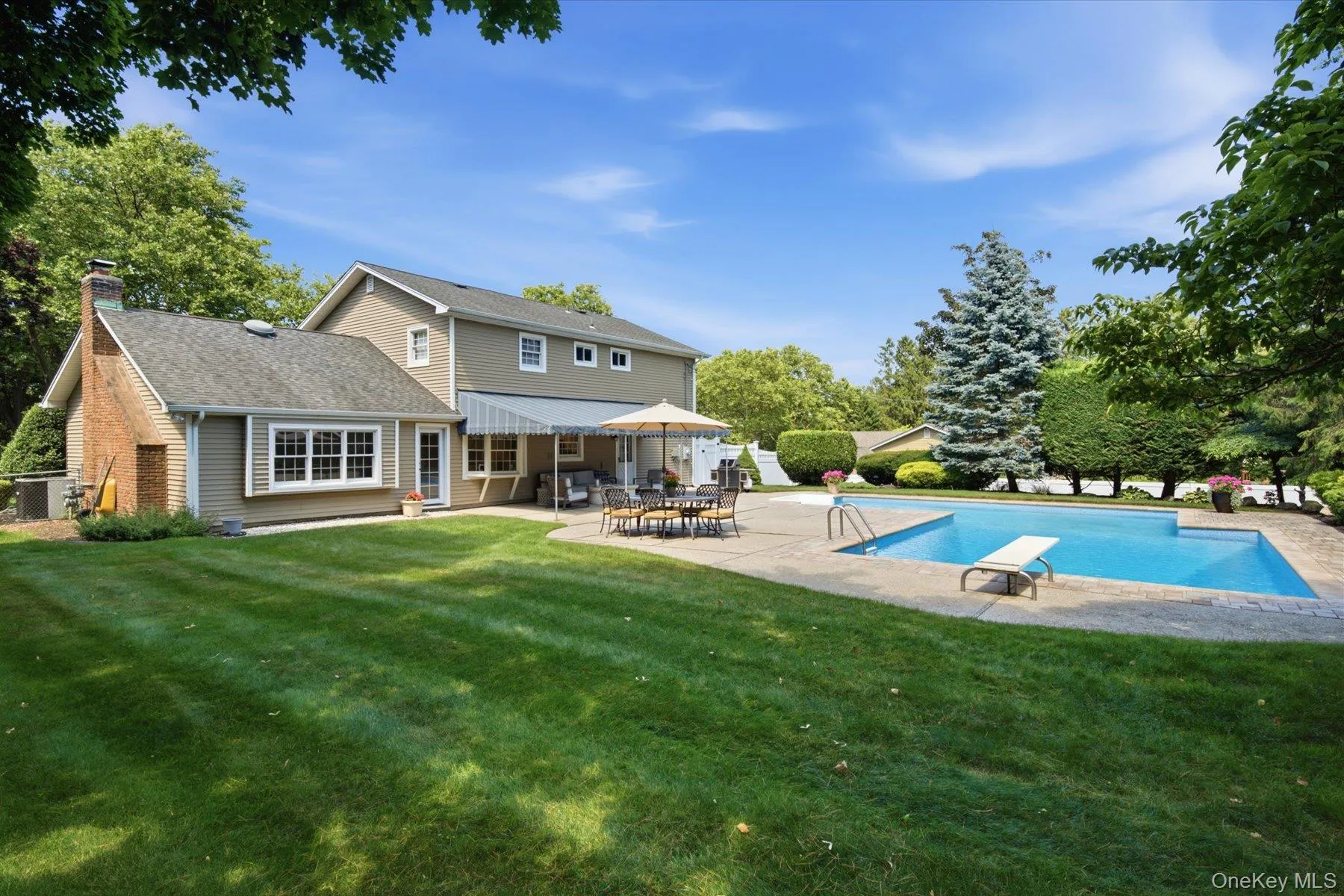 Expansive backyard offering plenty of space for outdoor enjoyment Expansive backyard offering plenty of space for outdoor enjoyment