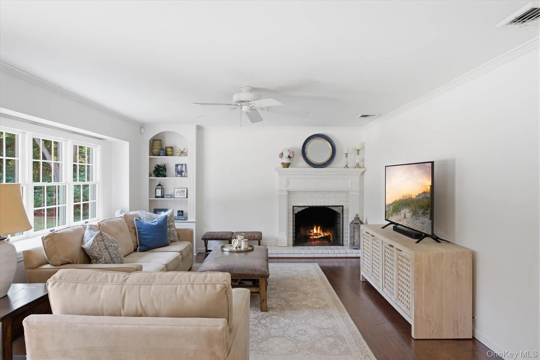 Bright and spacious den with wood burning fireplace Bright and spacious den with wood burning fireplace