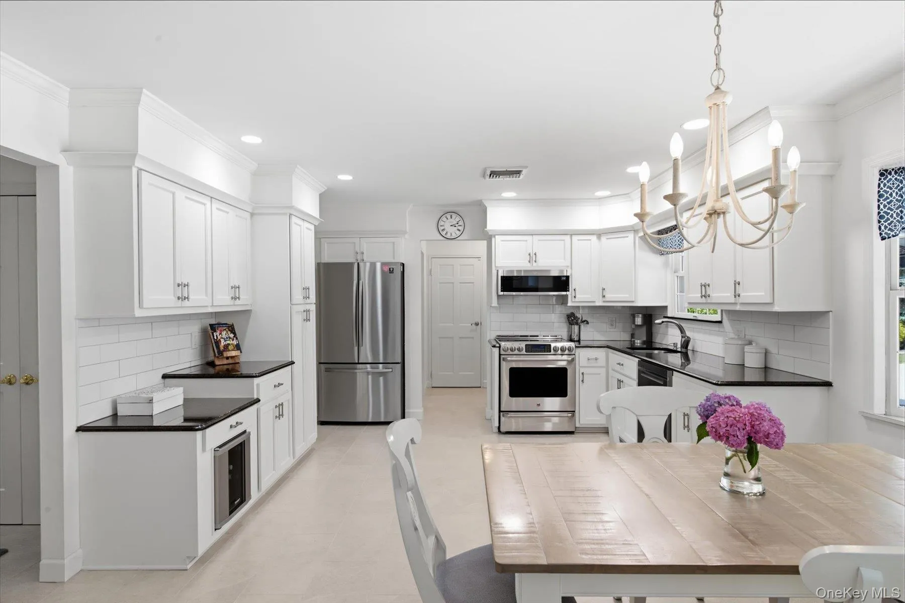 Eat in kitchen with stainless steel appliances Eat in kitchen with stainless steel appliances