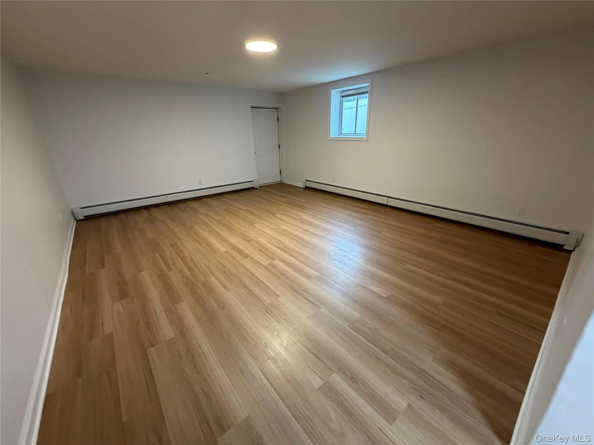 Lower level Bonus Room walk out to yard Lower level Bonus Room walk out to yard
