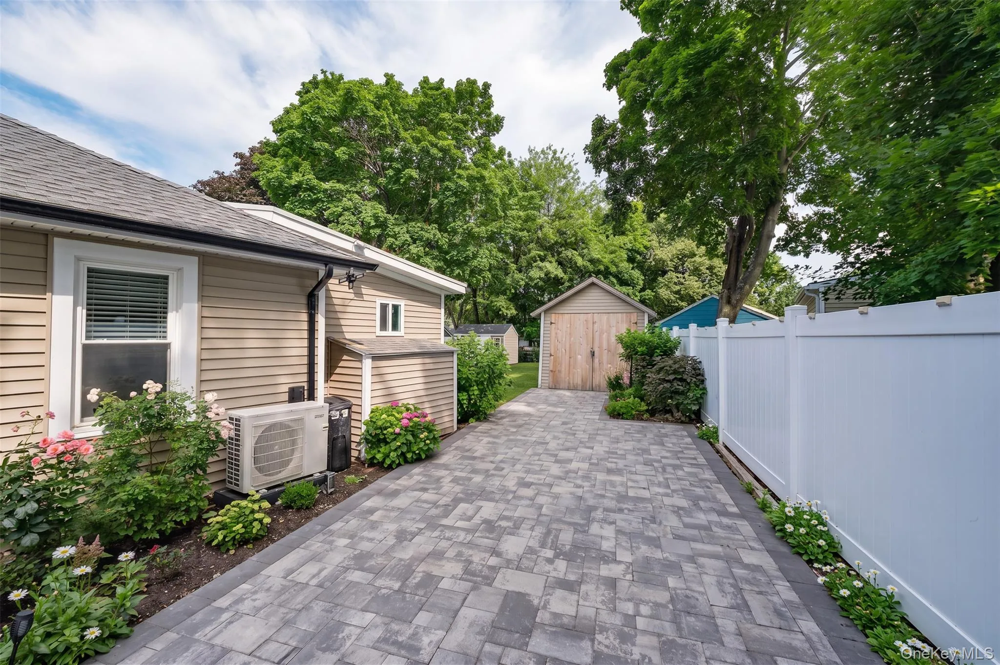Side paved patio Side paved patio