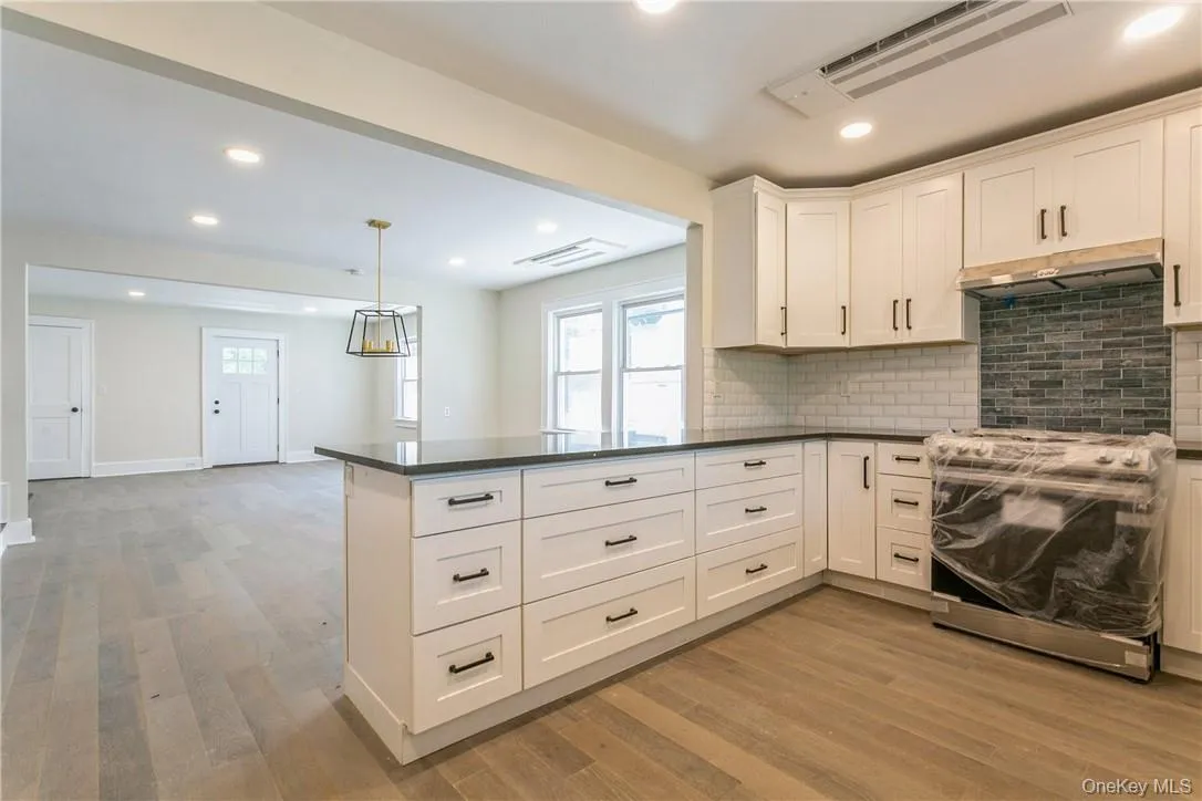 Kitchen into Dining Area - Living RM Kitchen into Dining Area - Living RM