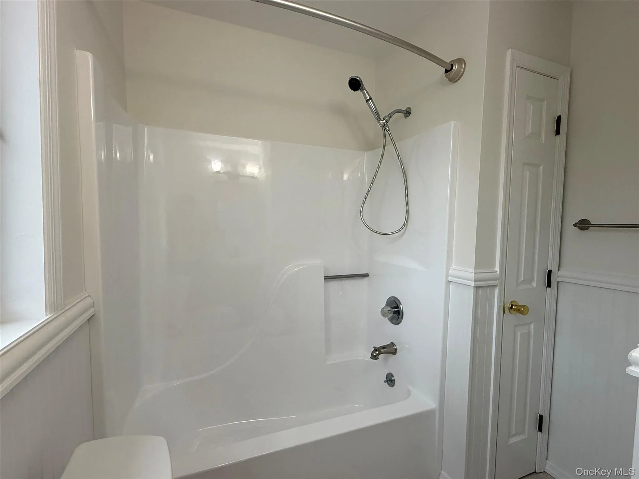 The bathroom features a bathtub for added comfort and convenience. The bathroom features a bathtub for added comfort and convenience.