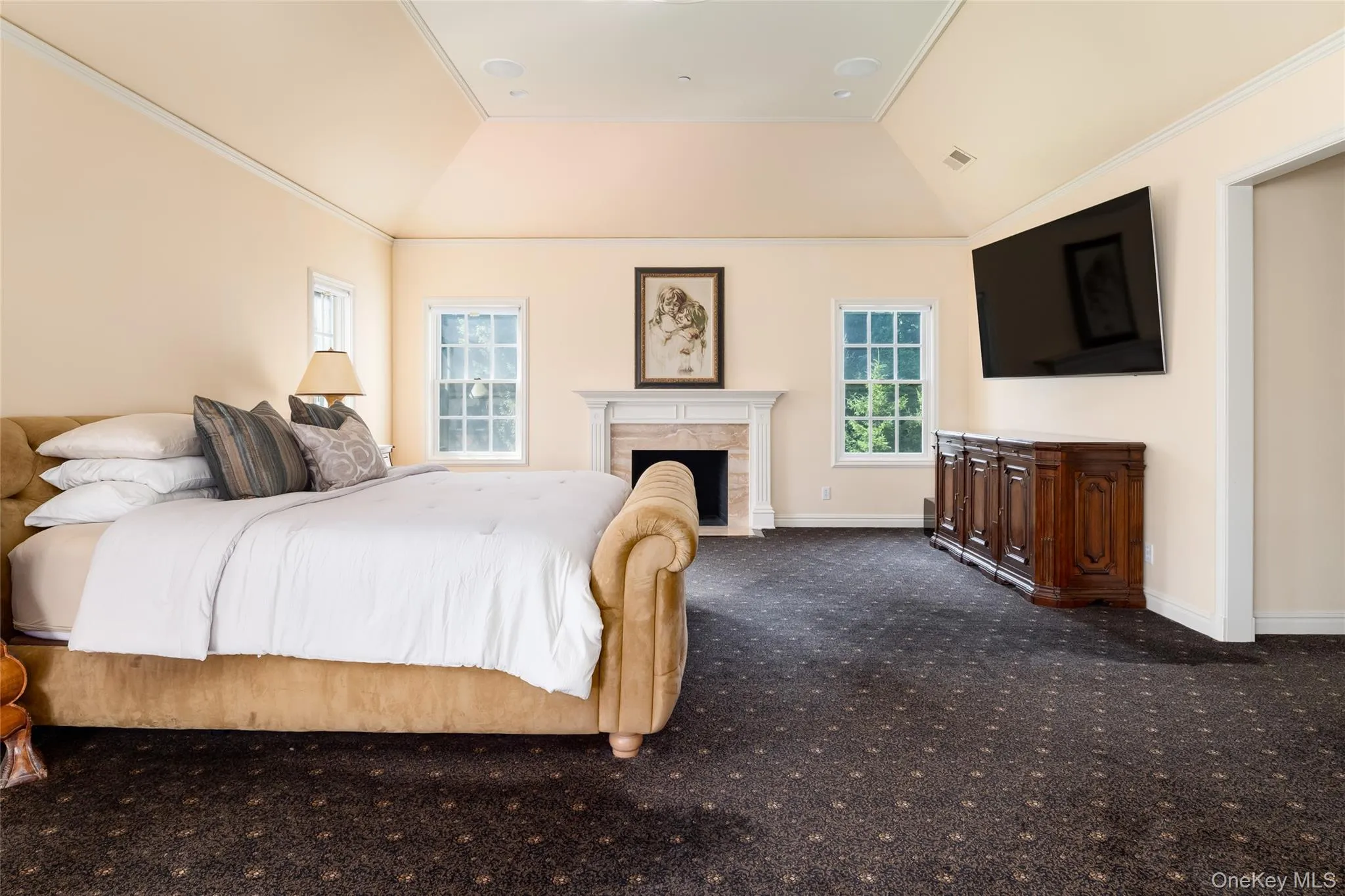 Luxurious Primary Bedroom with fireplace Luxurious Primary Bedroom with fireplace