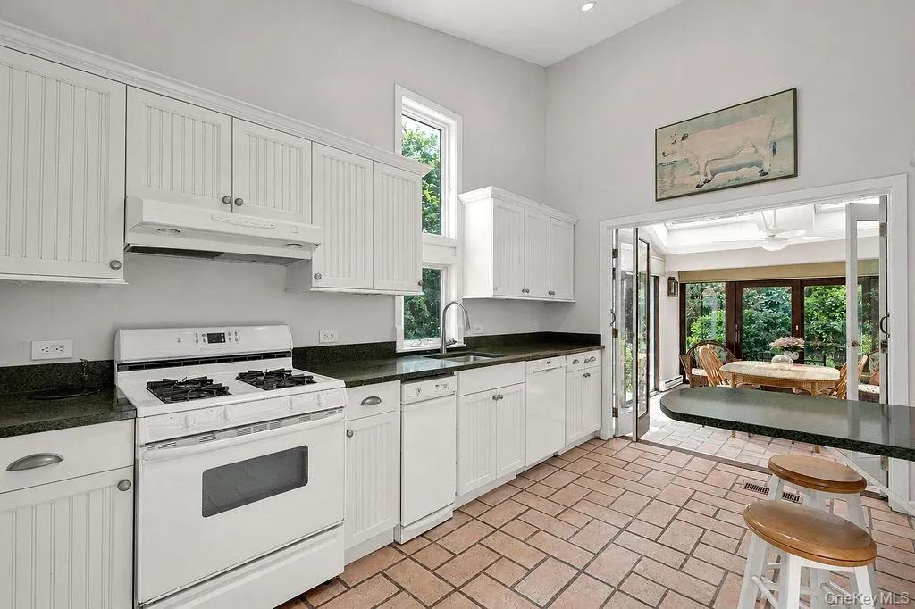 Kitchen with garden views Kitchen with garden views