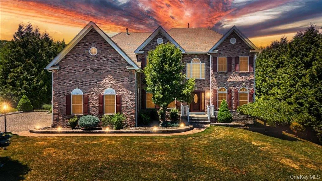 Front of structure during the evening as the sunsets; Front of structure during the evening as the sunsets;