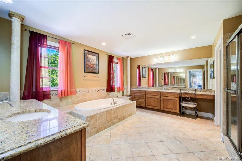 Large en suite with Shower and Whirlpool tub; Also, Water closet; Large en suite with Shower and Whirlpool tub; Also, Water closet;