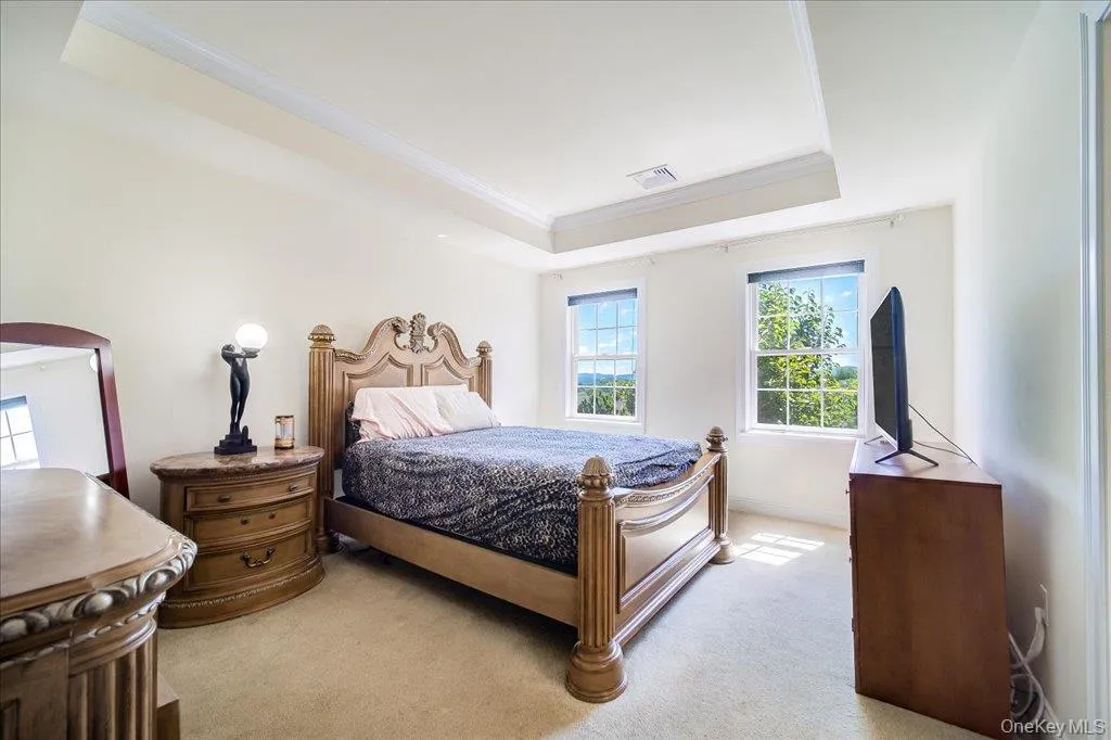 Master Bedroom with en suite (2nd full bath) and tray ceilings; Master Bedroom with en suite (2nd full bath) and tray ceilings;