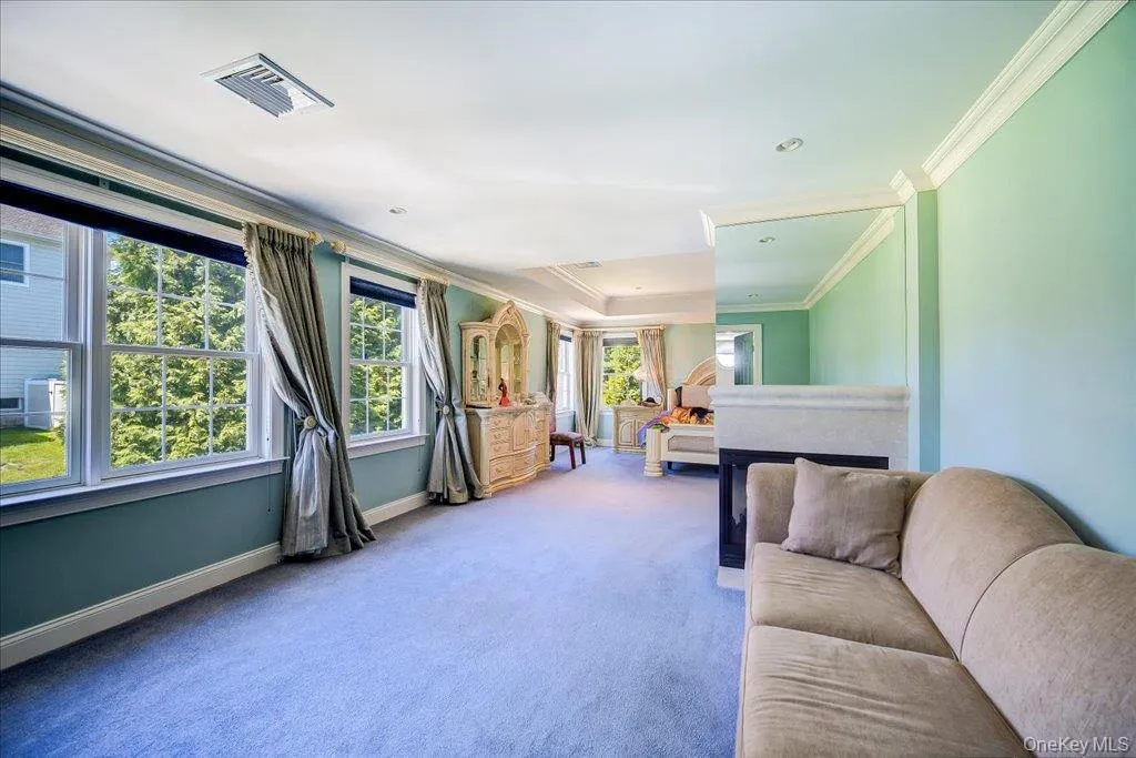 Sitting enclave with double sided fireplace; Lots of natural sunlight. Sitting enclave with double sided fireplace; Lots of natural sunlight.