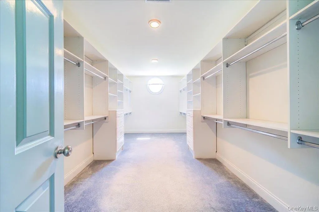 Large Walk-in Closet; (AI shows empty closet) Large Walk-in Closet; (AI shows empty closet)