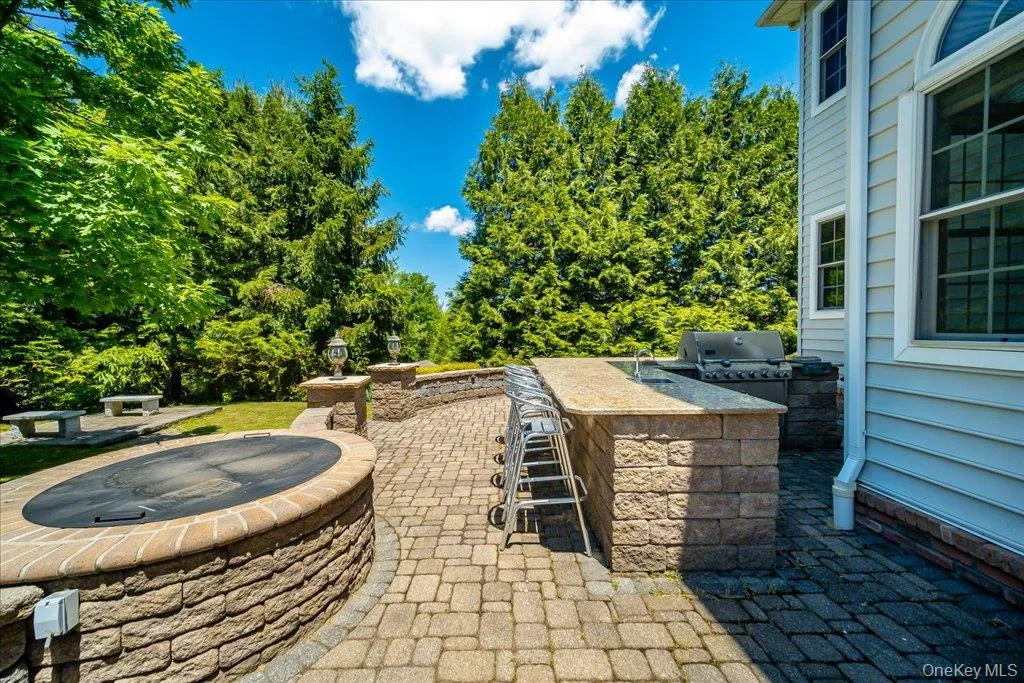 Outdoor Kitchen and Built-in Firepit; Outdoor Kitchen and Built-in Firepit;