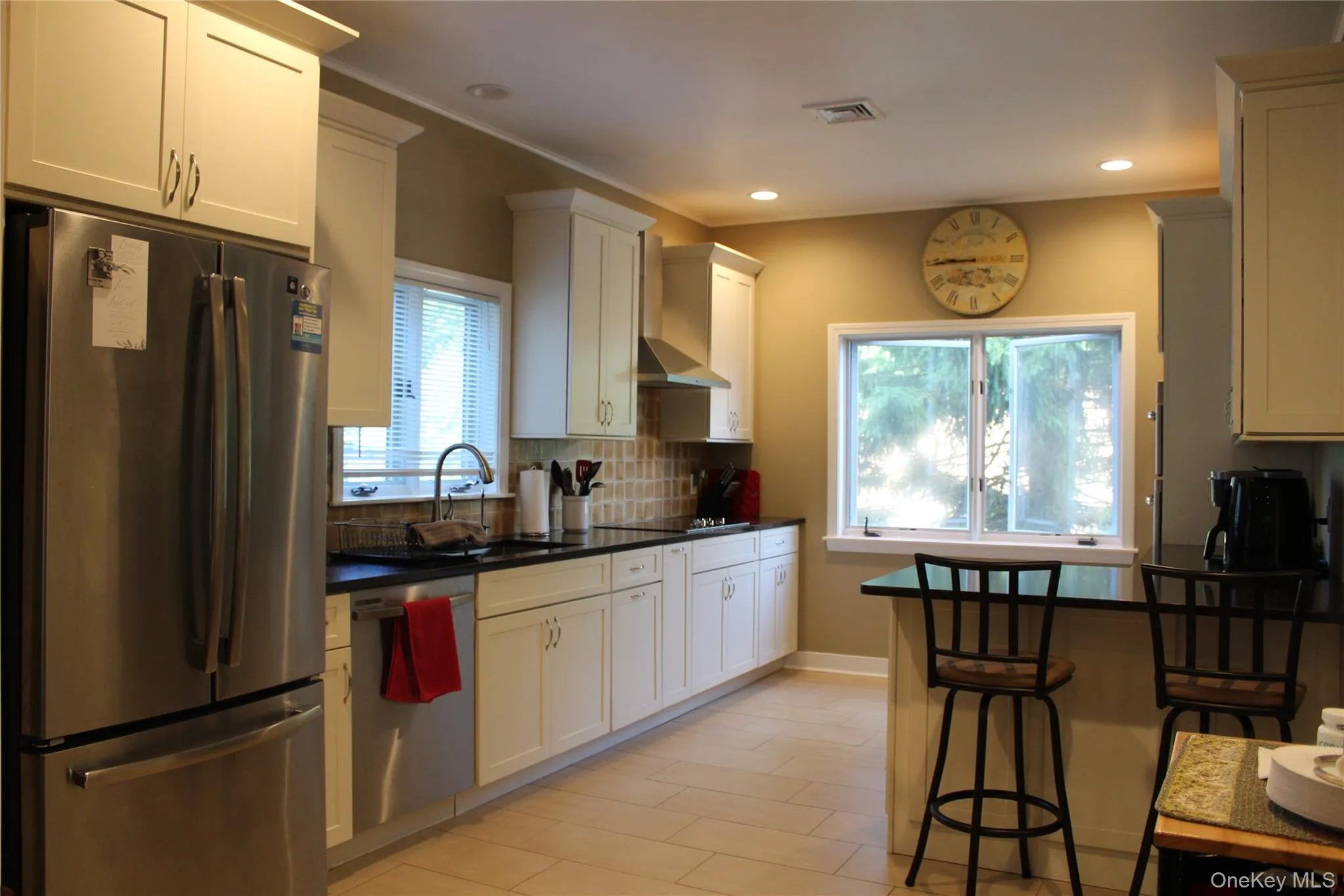 spacious kitchen with breakfast bar spacious kitchen with breakfast bar