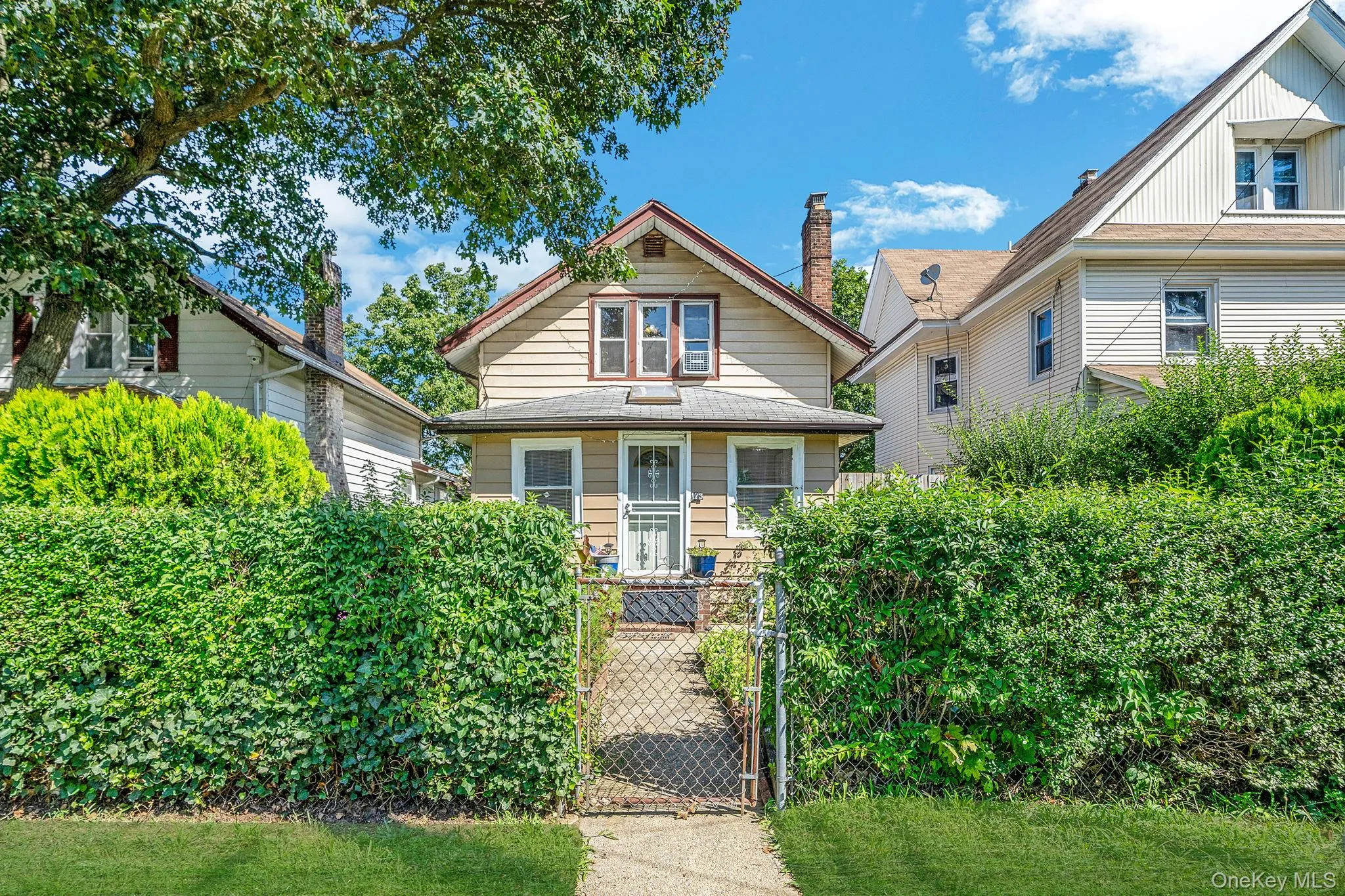 View of front of home featuring a gate View of front of home featuring a gate