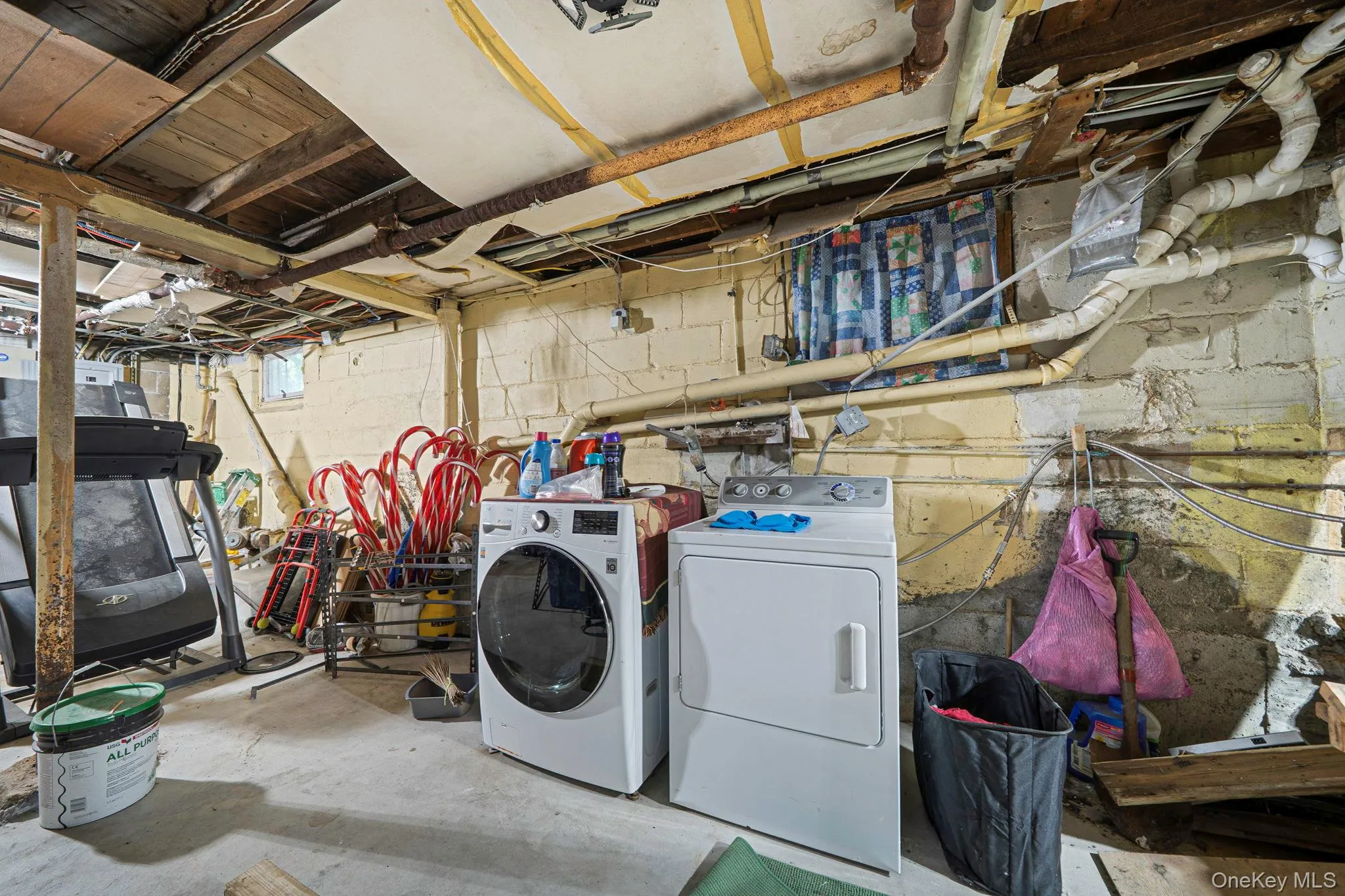 Washroom featuring washing machine and clothes dryer Washroom featuring washing machine and clothes dryer