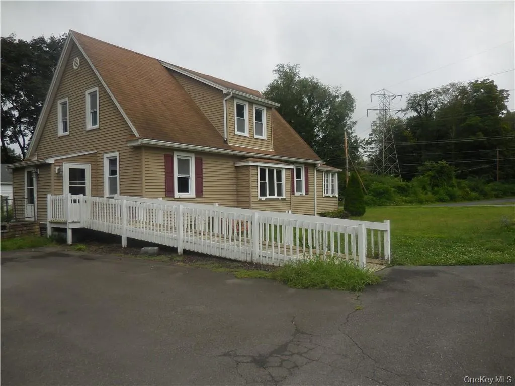 View of back and side of the property and lawn View of back and side of the property and lawn