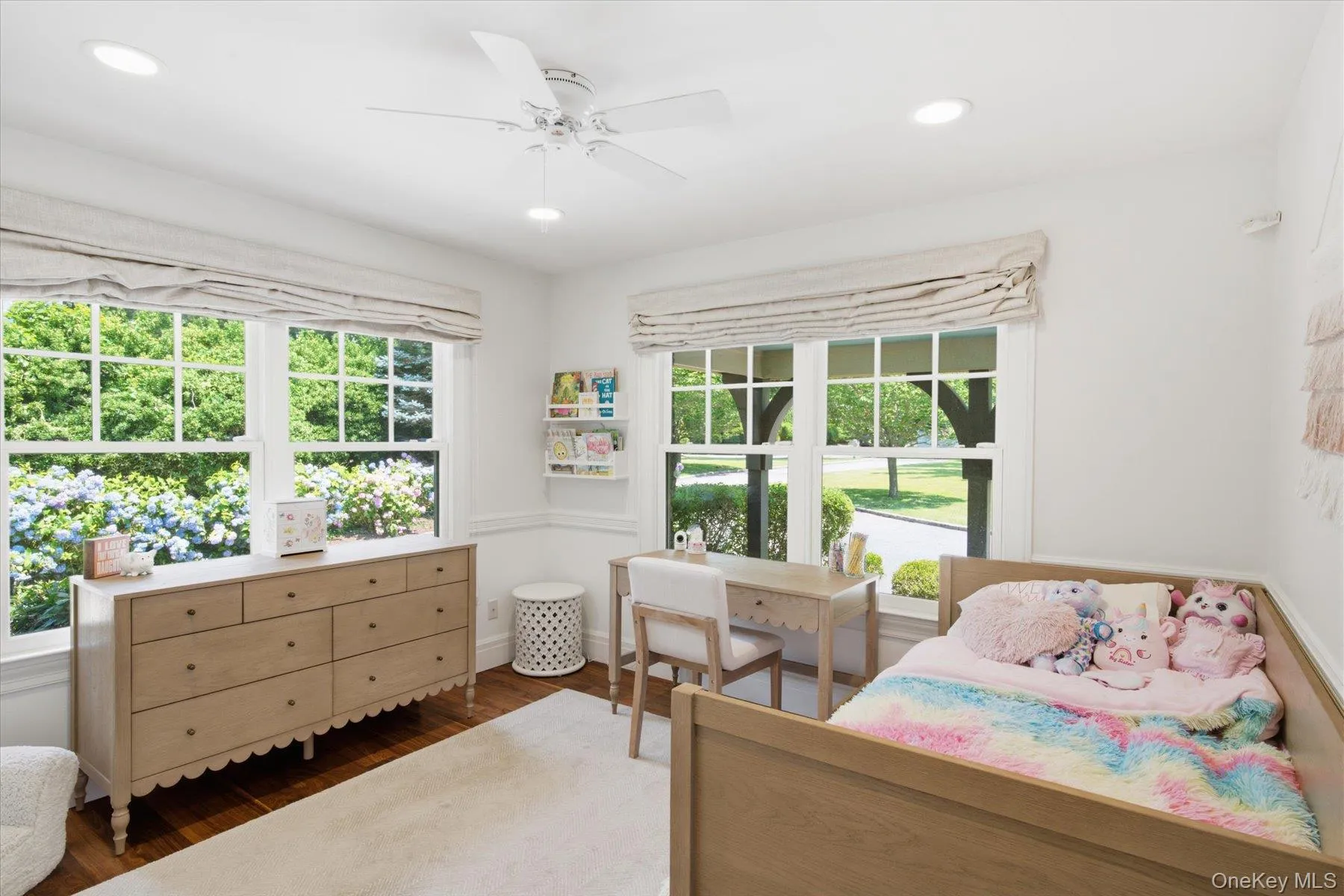 Generously sized bedroom filled with natural light. Generously sized bedroom filled with natural light.