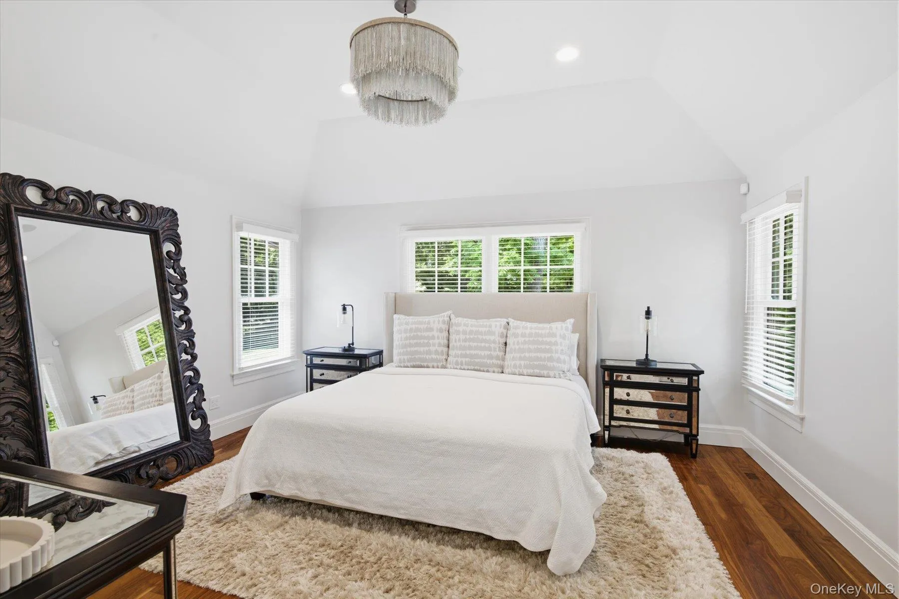 Spacious primary suite with two walk in closets and en suite bath Spacious primary suite with two walk in closets and en suite bath