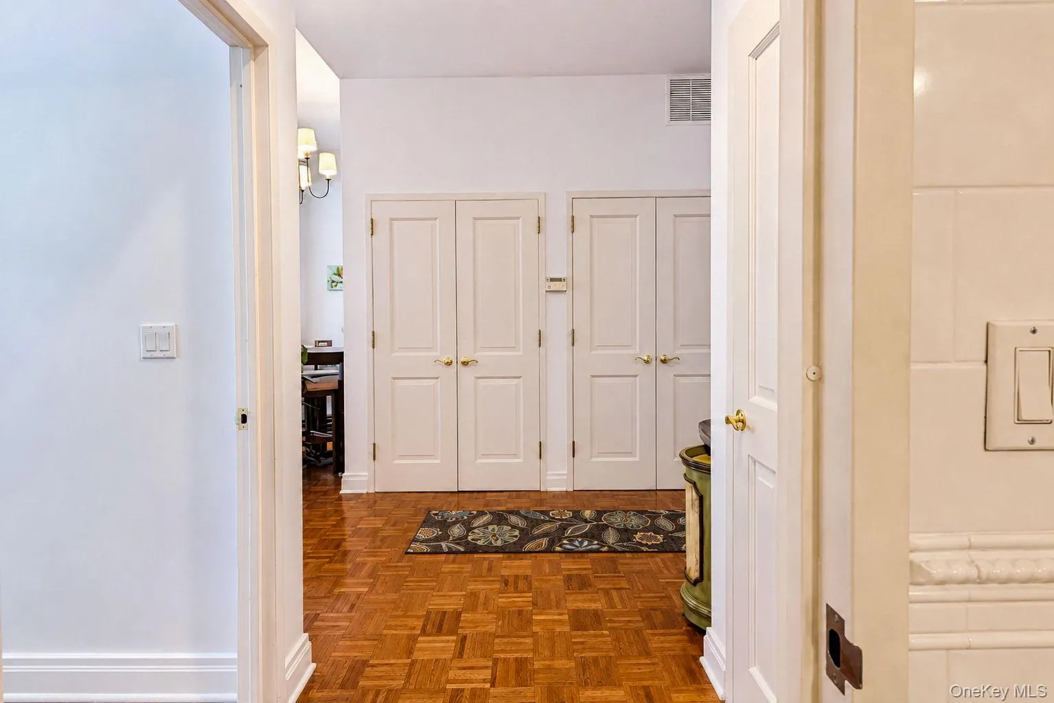Showing 2 entry closets from hallway Showing 2 entry closets from hallway