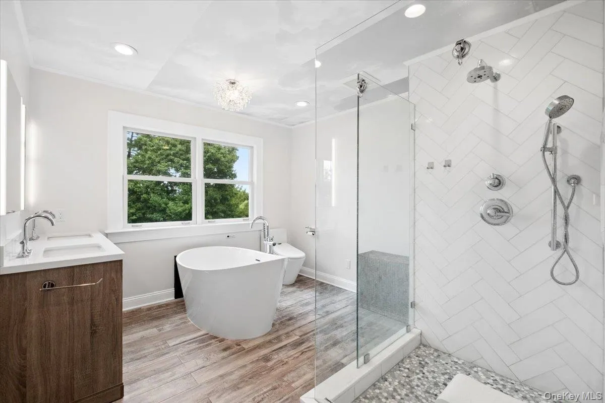 Primary bathroom. Soaking tub takes advantage of the view too. Primary bathroom. Soaking tub takes advantage of the view too.