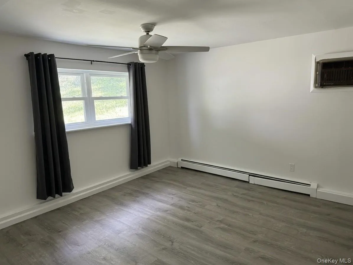 Bedroom 2 with a window and large closet. Bedroom 2 with a window and large closet.
