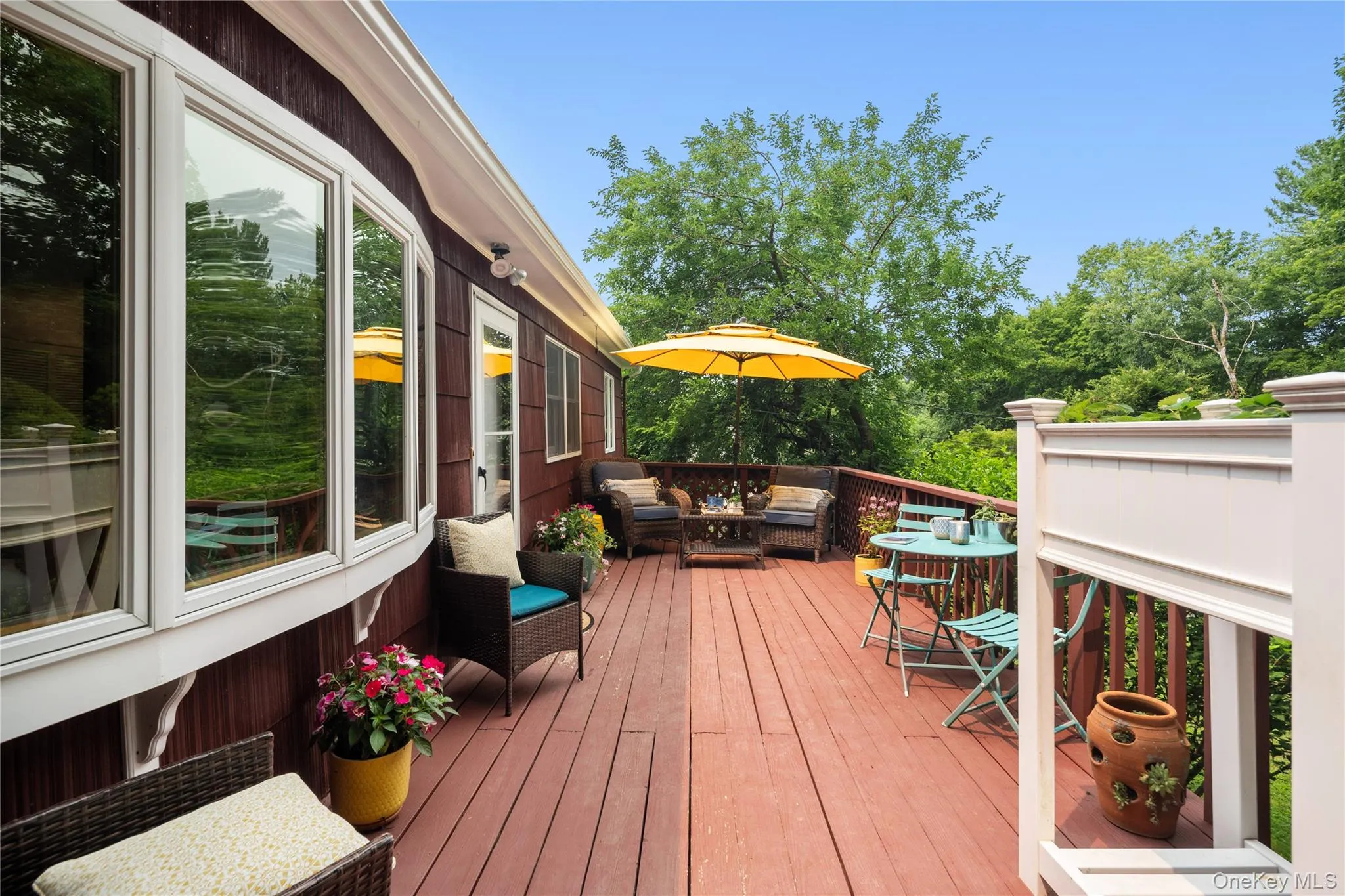 The story continues outside with a large wraparound deck designed for outdoor living and entertaining. The story continues outside with a large wraparound deck designed for outdoor living and entertaining.