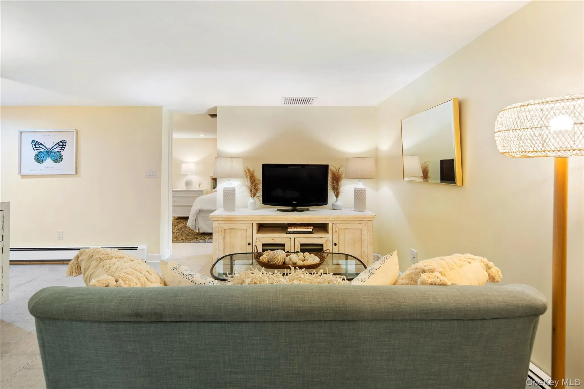 The living area is spacious, and the bedroom is just beyond the wall. The living area is spacious, and the bedroom is just beyond the wall.