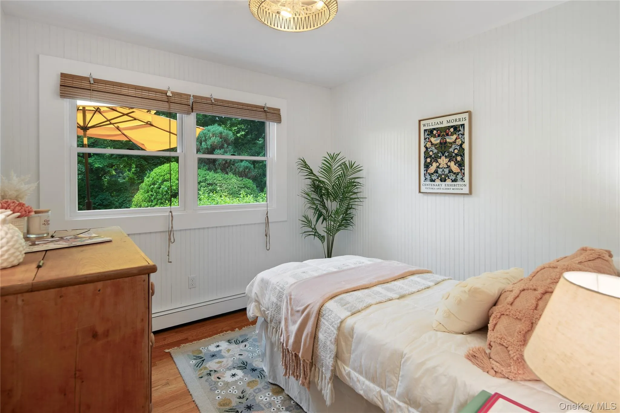 The third bedroom on the main floor has a large window with backyard views and a deep closet. The third bedroom on the main floor has a large window with backyard views and a deep closet.