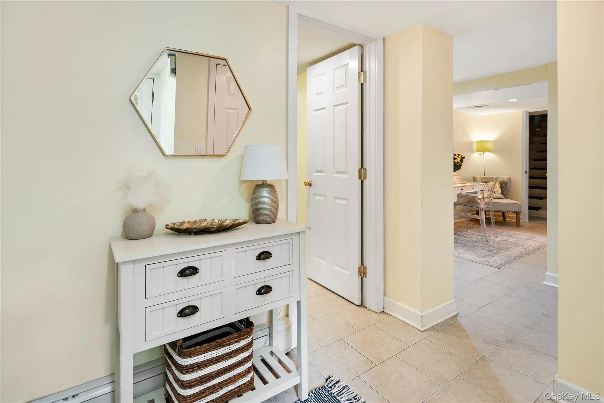 Just off the entry are the bedroom, office, full bath, living and dining areas, and the summer kitchen. Just off the entry are the bedroom, office, full bath, living and dining areas, and the summer kitchen.