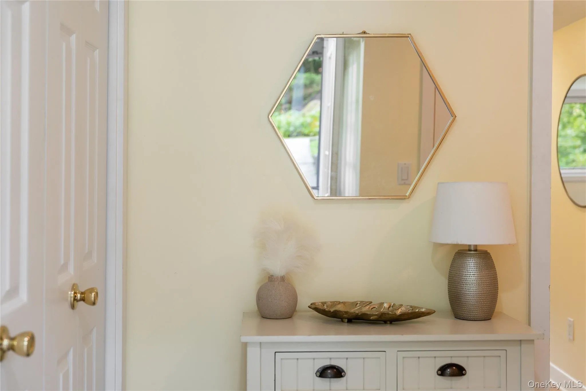 The lower-level mother/daughter suite is accessed by a separate entry or steps from the main floor. The lower-level mother/daughter suite is accessed by a separate entry or steps from the main floor.