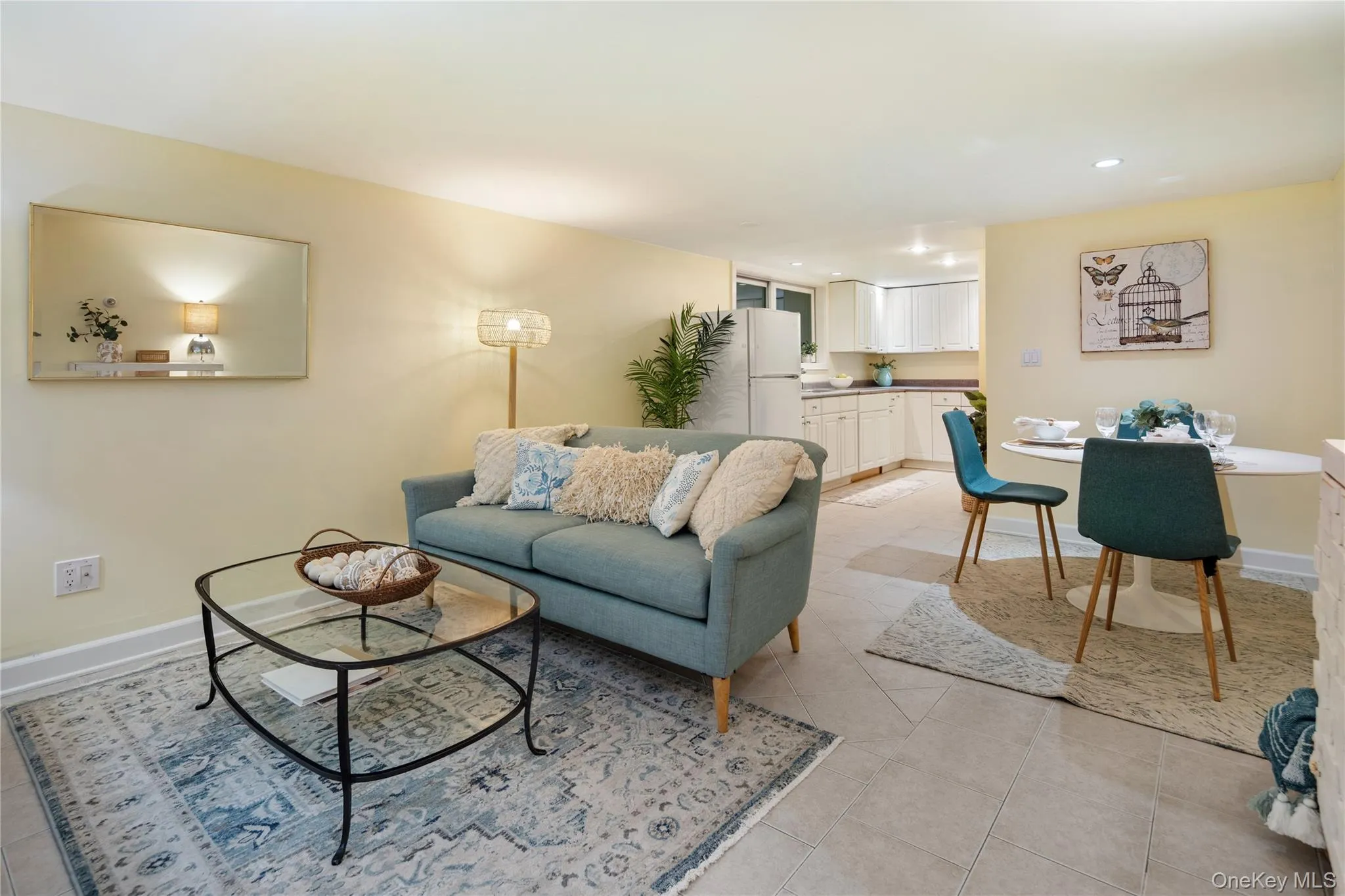 Fantastic in-law suite featuring an open living and dining area with a summer kitchen. Windows and recessed lights provide ample light. Fantastic in-law suite featuring an open living and dining area with a summer kitchen. Windows and recessed lights provide ample light.