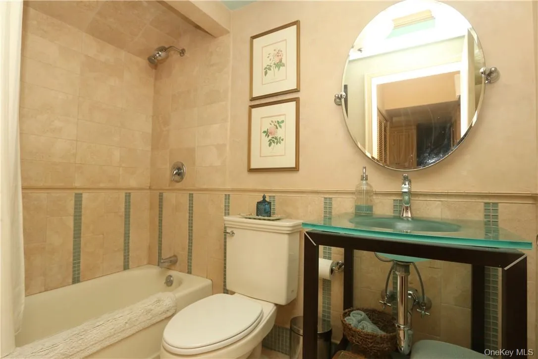 Bathroom with custom vanity and tub Bathroom with custom vanity and tub