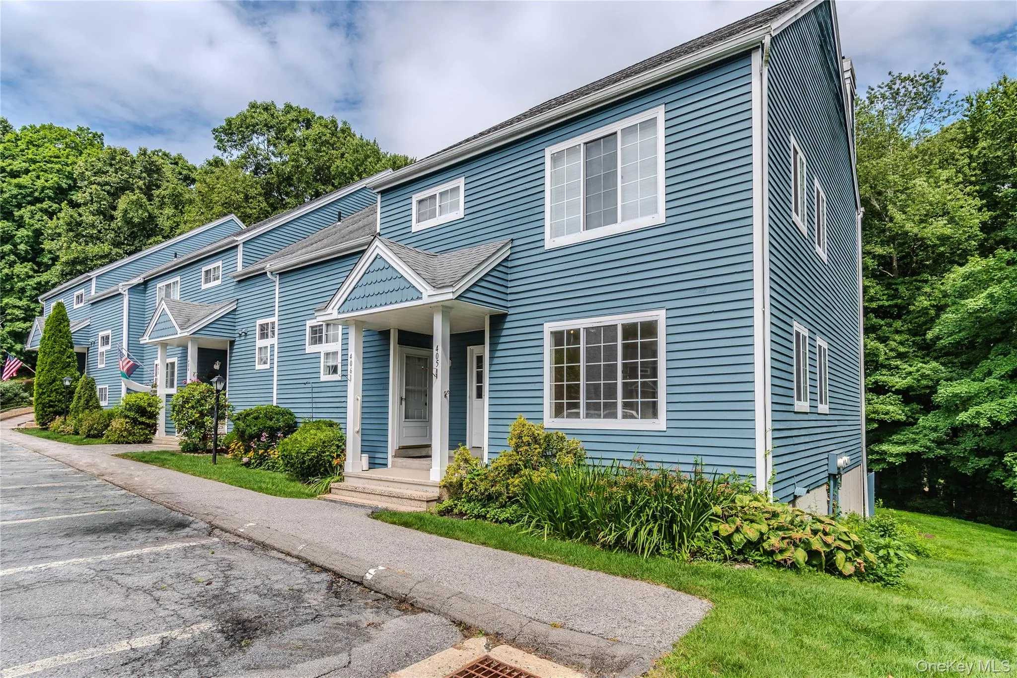 End unit with assigned parking space in front of unit End unit with assigned parking space in front of unit