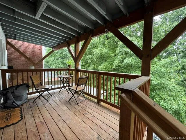 Cover deck overlooking the water and trees... Cover deck overlooking the water and trees...