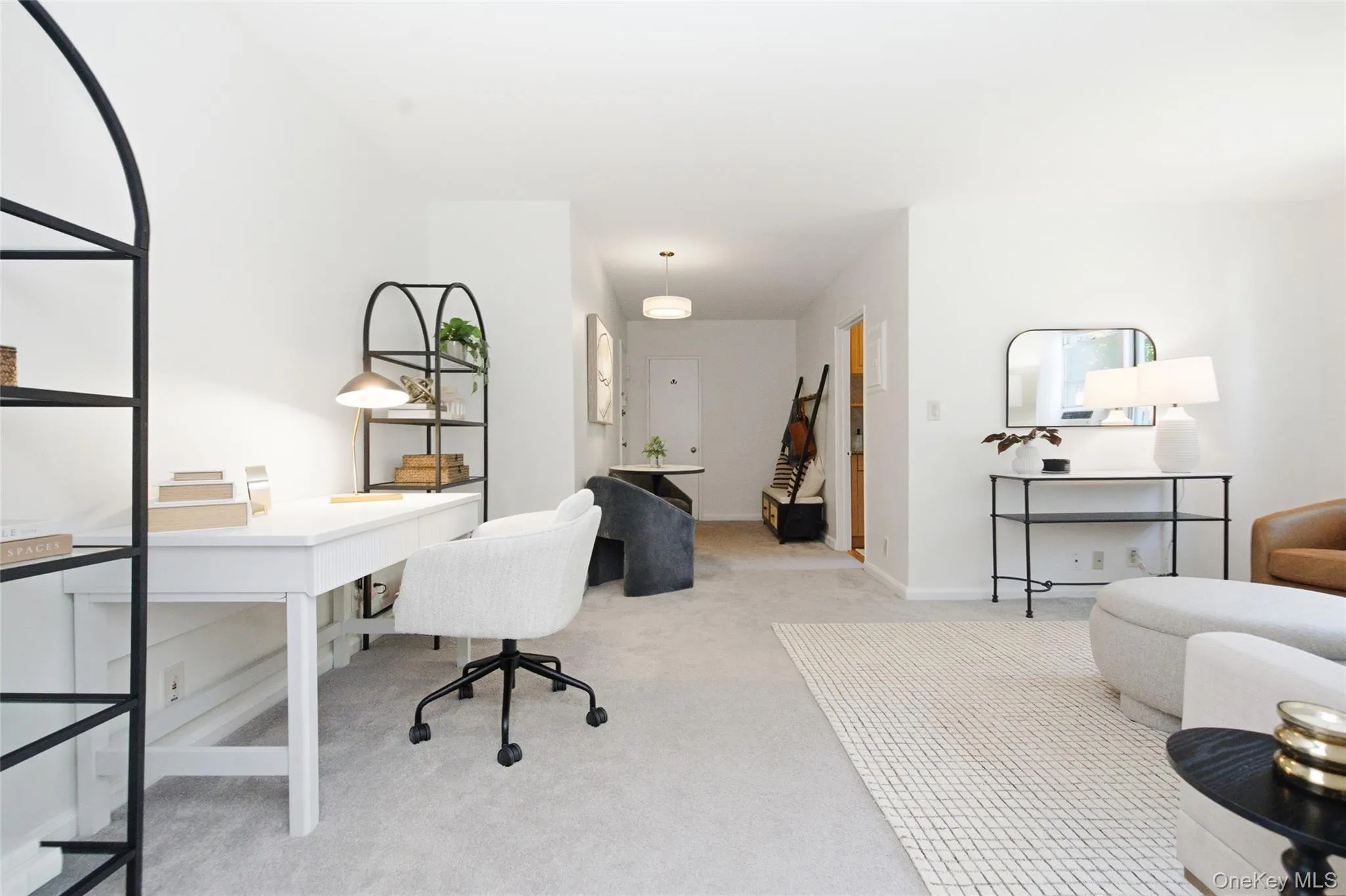 Flexible living area offering multiple furniture layout possibilities for everyday living and entertaining. Flexible living area offering multiple furniture layout possibilities for everyday living and entertaining.