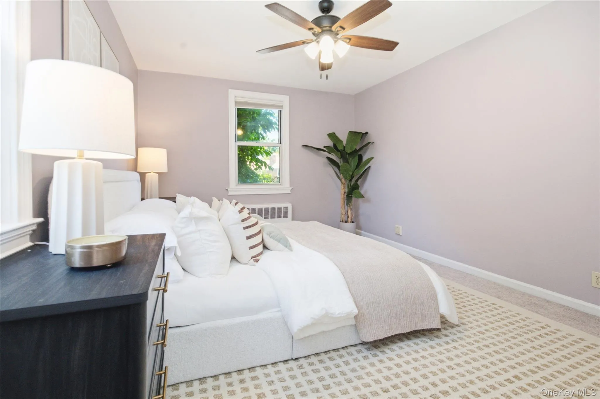 Another view of the bedroom showcasing flexible furniture placement and the room's inviting scale. Another view of the bedroom showcasing flexible furniture placement and the room's inviting scale.