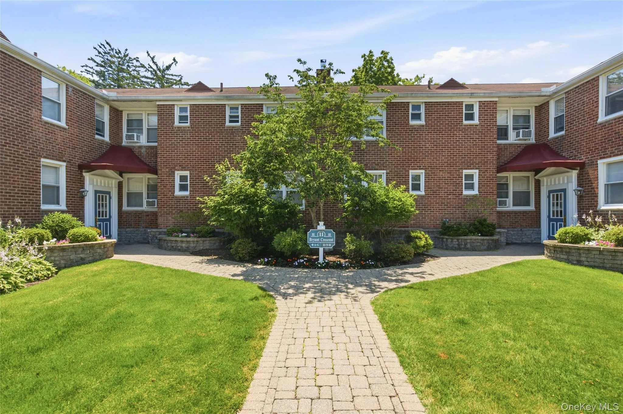 Charming front entrance surrounded by mature landscaping and manicured grounds, creating exceptional curb appeal. Charming front entrance surrounded by mature landscaping and manicured grounds, creating exceptional curb appeal.