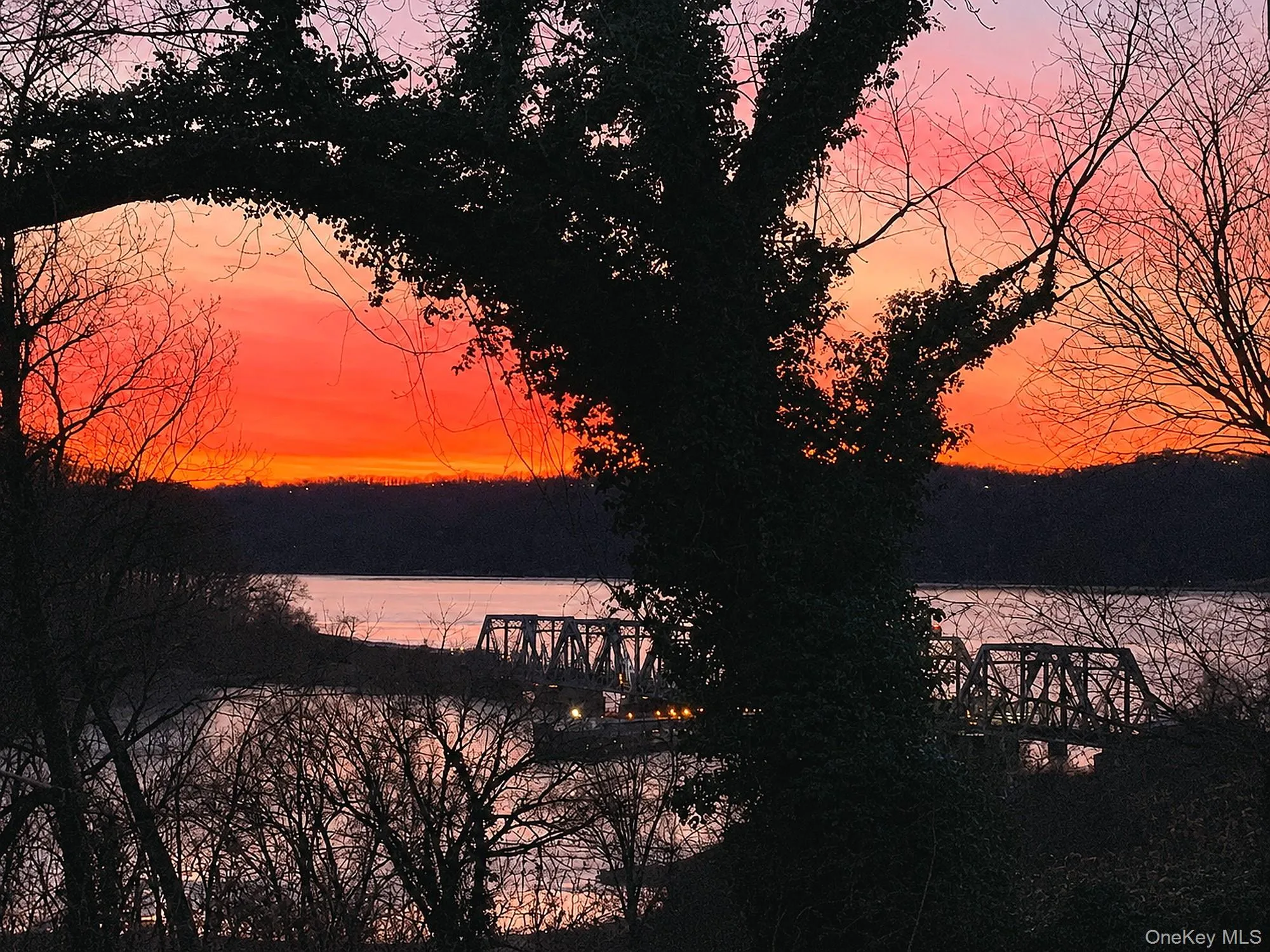 View of sunset over the Hudson River from the living room View of sunset over the Hudson River from the living room