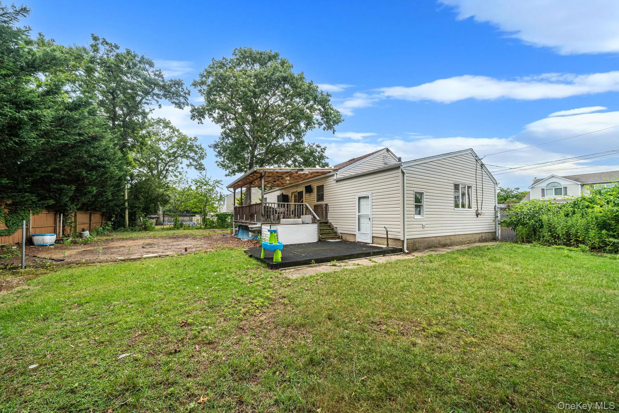As is backyard from side As is backyard from side