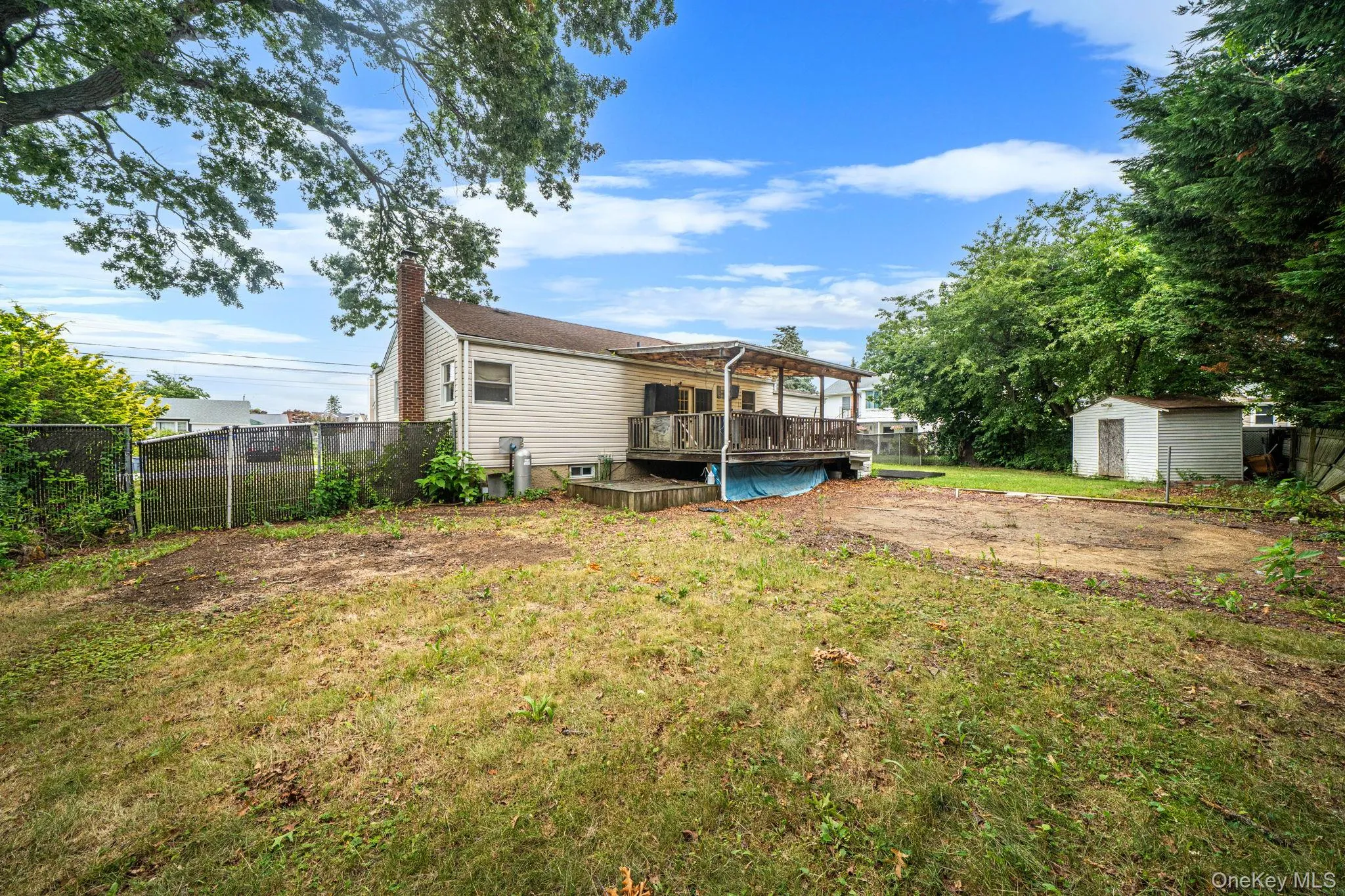 As is backyard , large space plenty of potential As is backyard , large space plenty of potential