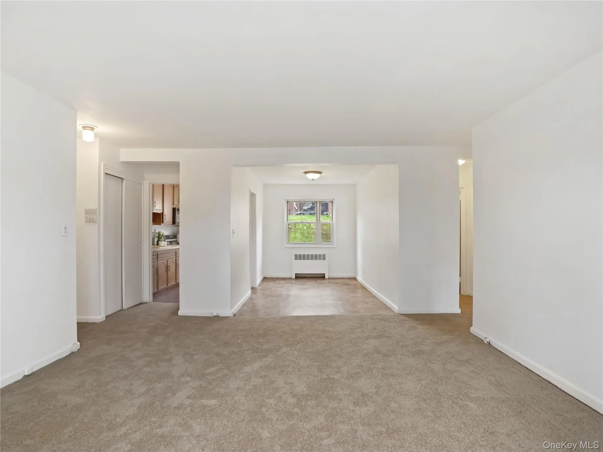 Living Room with great natural light, freshly painted walls and brand new carpet. Open to Dining Room. Living Room with great natural light, freshly painted walls and brand new carpet. Open to Dining Room.