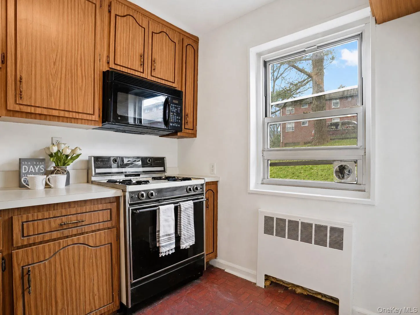 Kitchen featuring plenty of cabinet space, refrigerator, oven and microwave. Kitchen featuring plenty of cabinet space, refrigerator, oven and microwave.