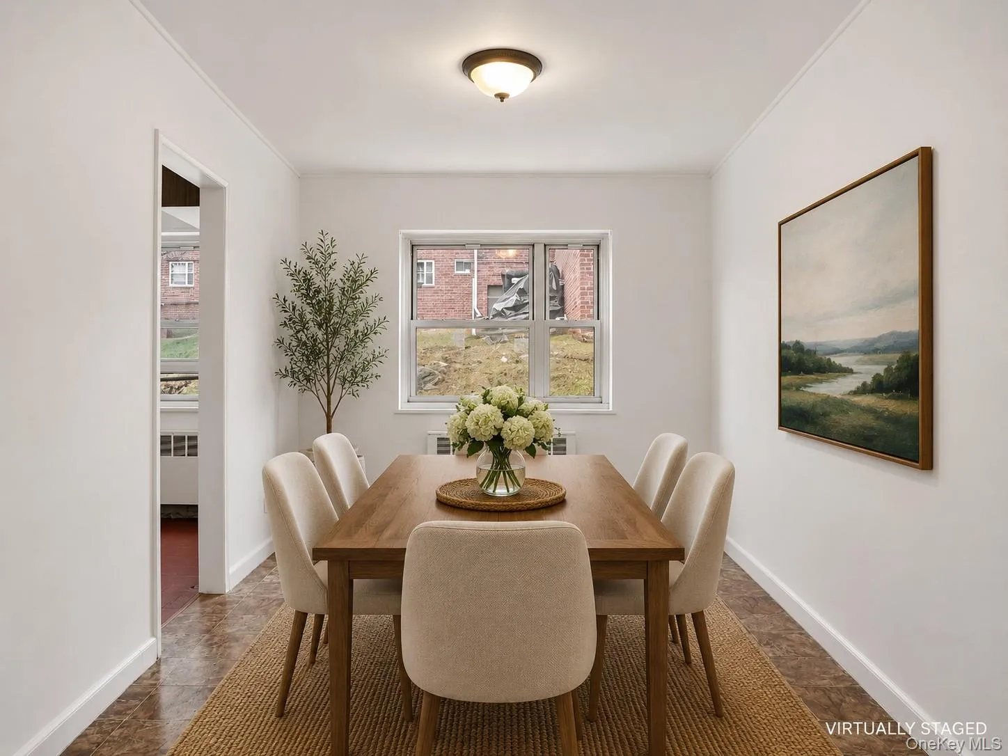 Virtually Staged. Dining Room just off the kitchen and open to Living Room. Freshly painted with laminate floor. Virtually Staged. Dining Room just off the kitchen and open to Living Room. Freshly painted with laminate floor.