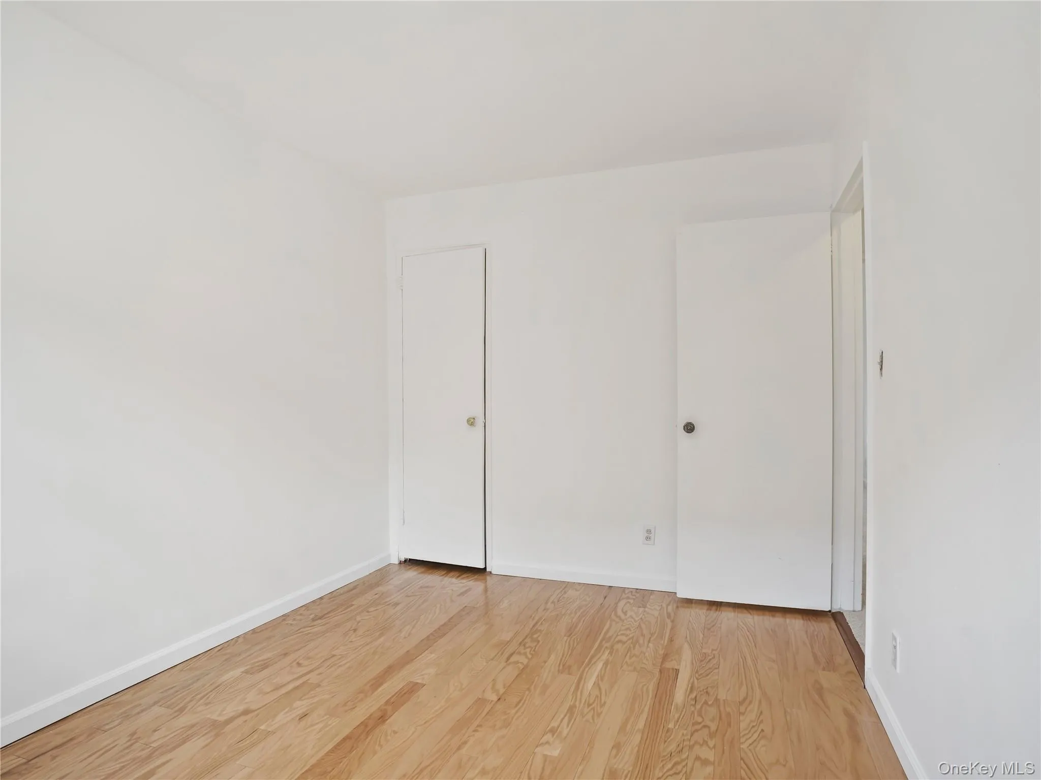 Bedroom with great natural light, freshly painted walls and wood floors. Bedroom with great natural light, freshly painted walls and wood floors.
